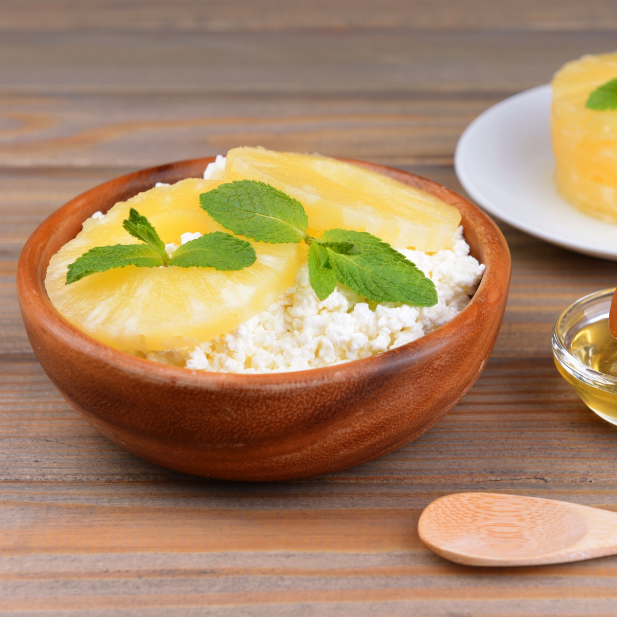 bowl of cottage cheese with pineapple slices