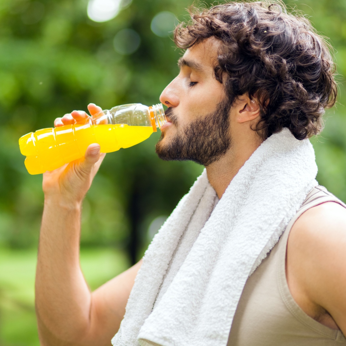 man drinking sports drink