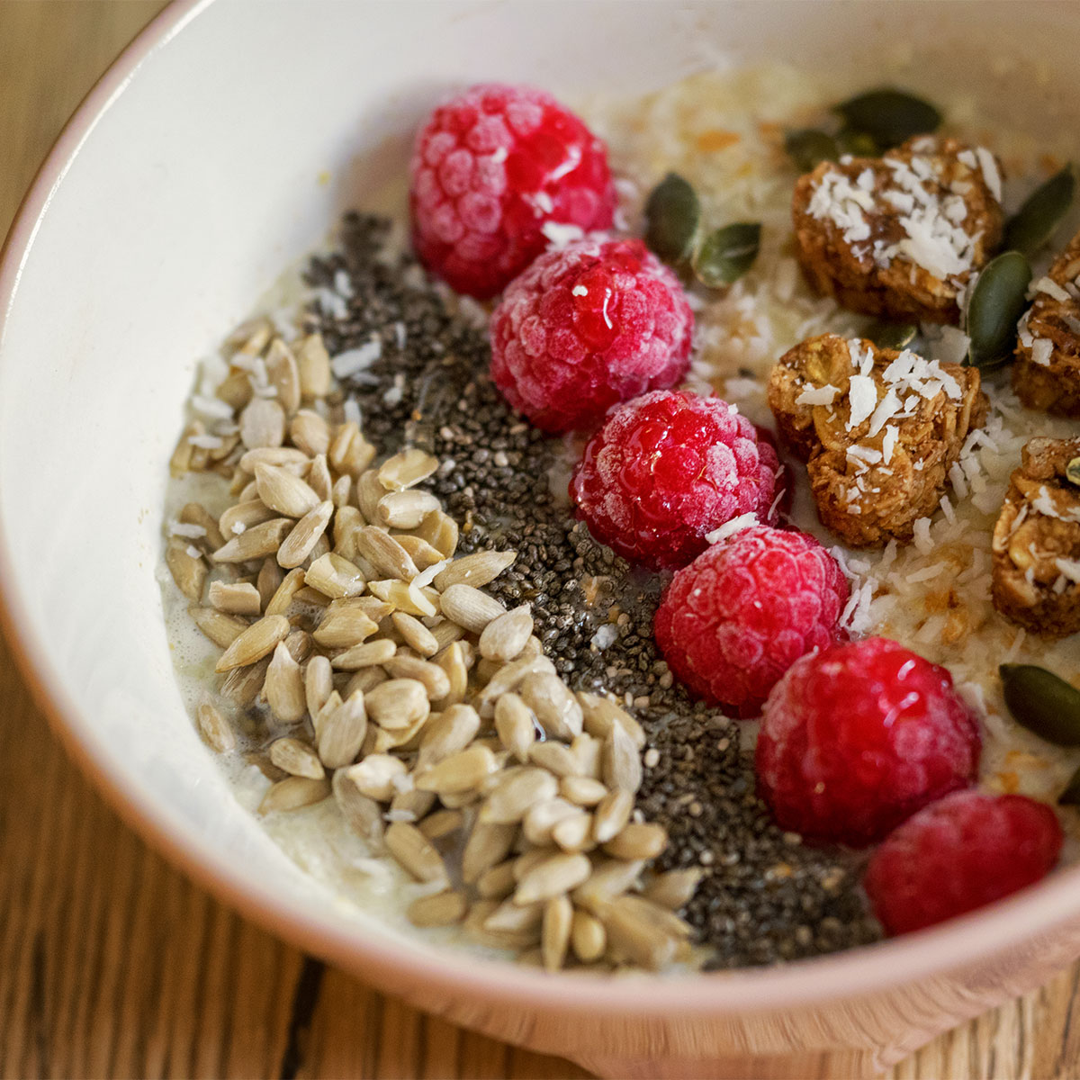 oatmeal topped with nuts and seeds