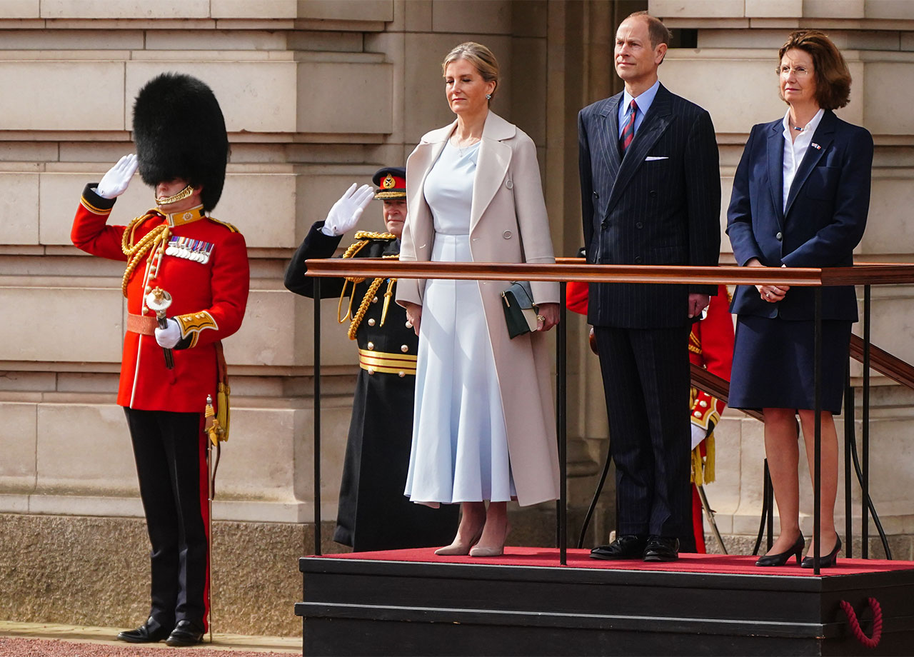 Prince Edward and Sophie Duchess of Edinburgh step in for King Charles and watch Changing of the Guard at Buckingham Palace