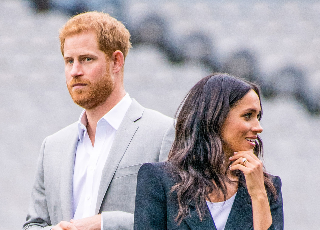 Prince Harry and Meghan Markle wearing blazers