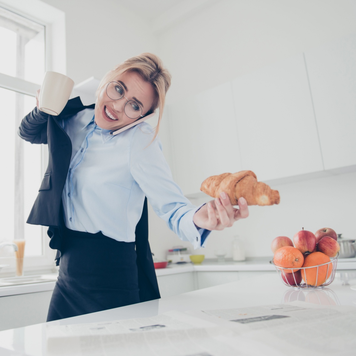 busy woman grabbing croissant