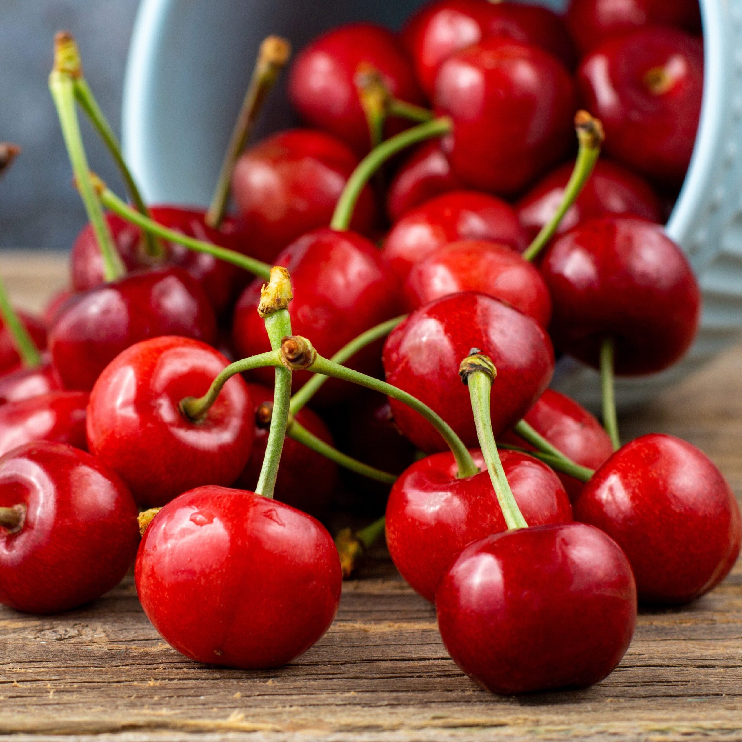 cherries spilling out of basket