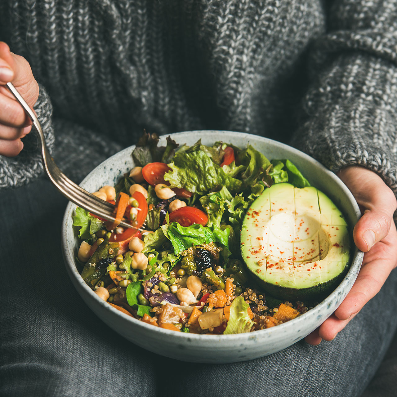 salad bowl with leafy greens and sweet potato