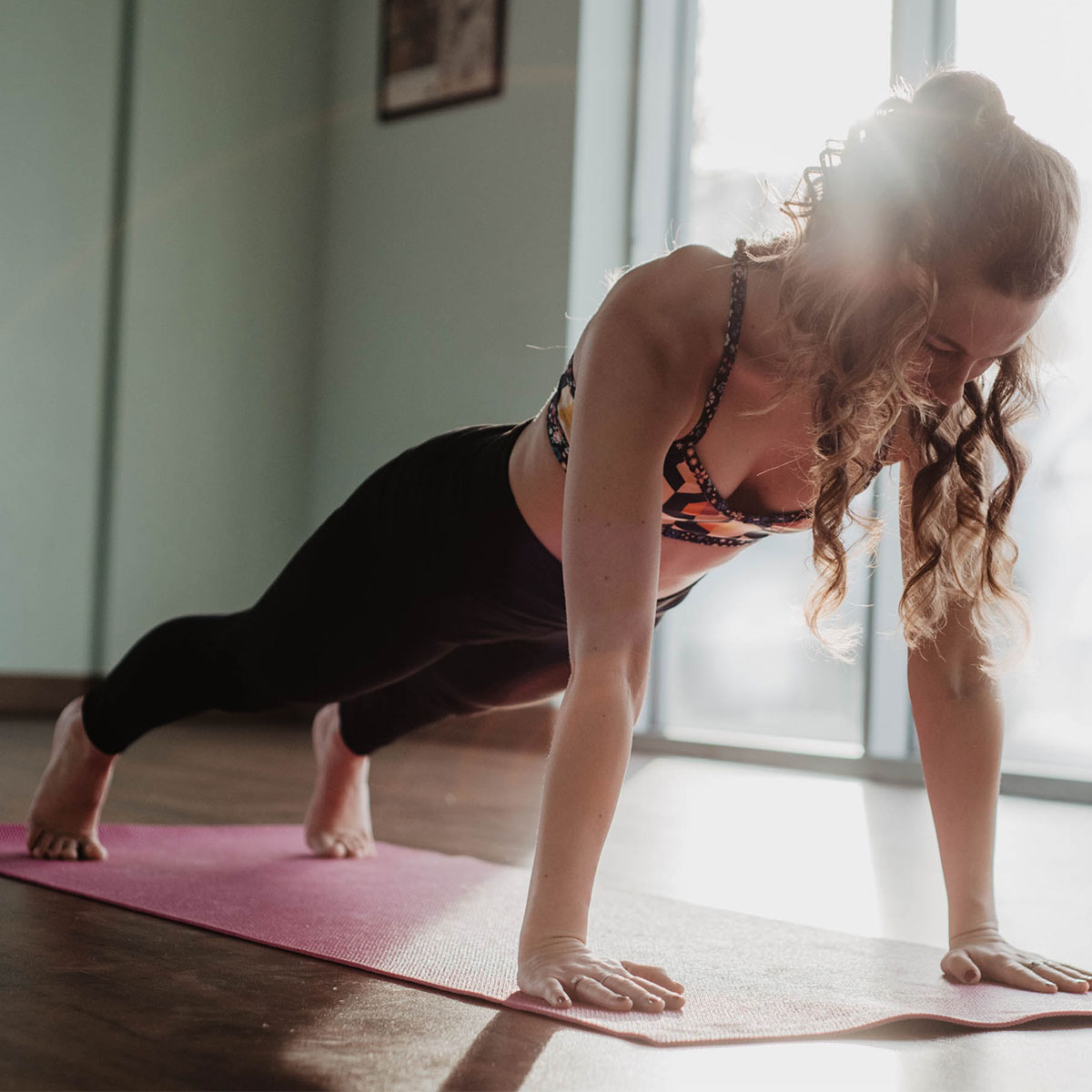 woman holding plank