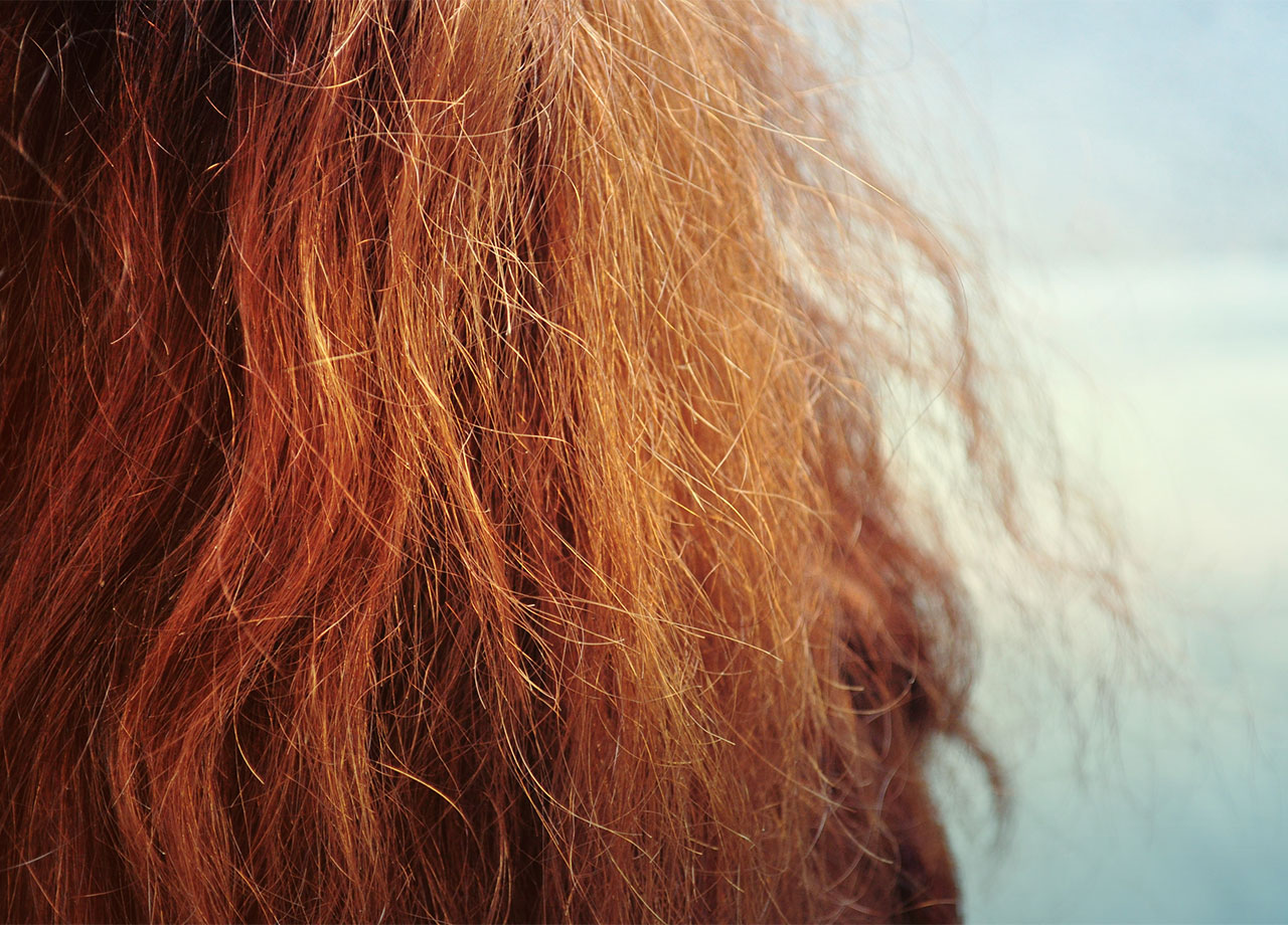 orange copper hair with frizz