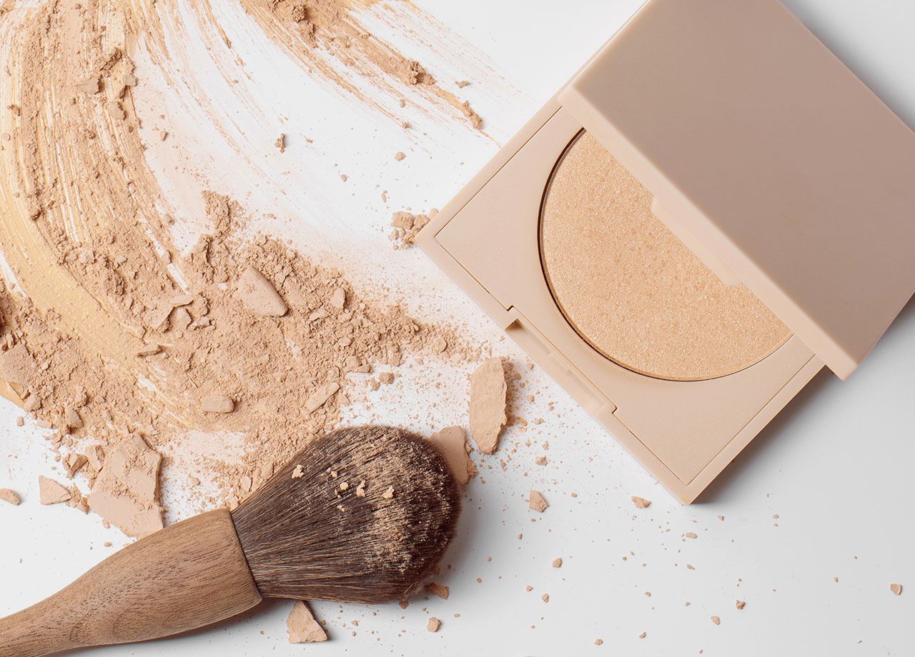 powder foundation compact with brush