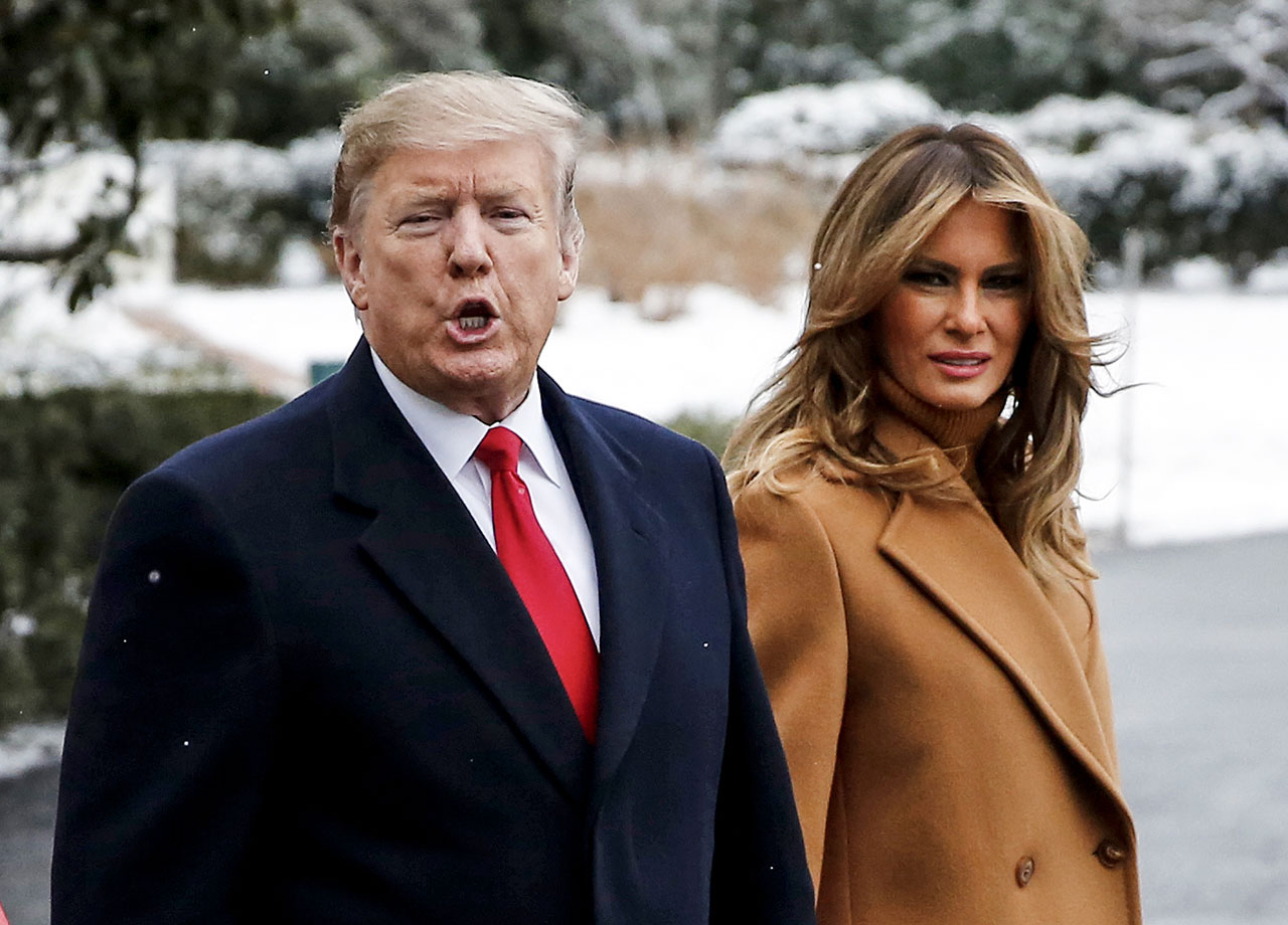 Donald and Melania Trump in the snow