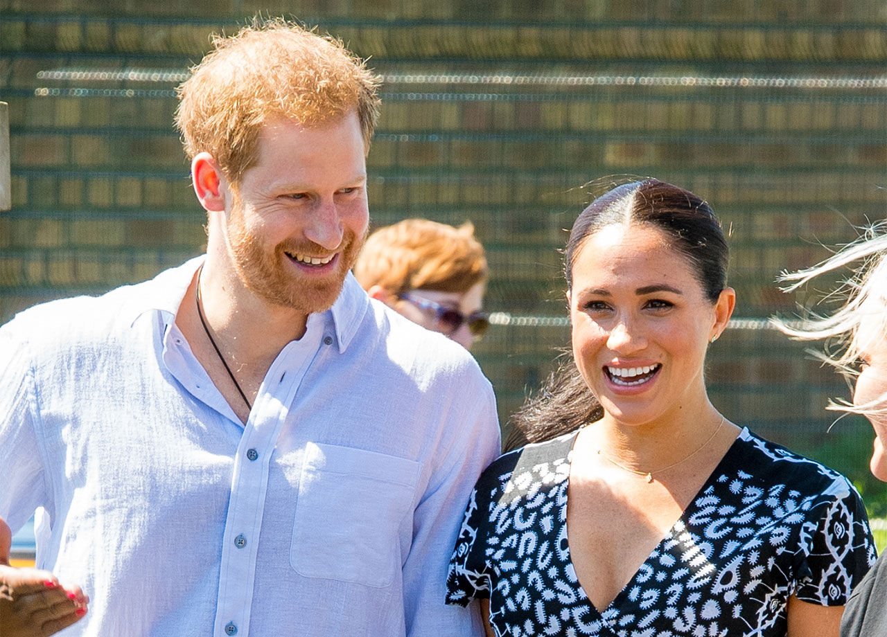 Prince Harry and Meghan Markle laughing