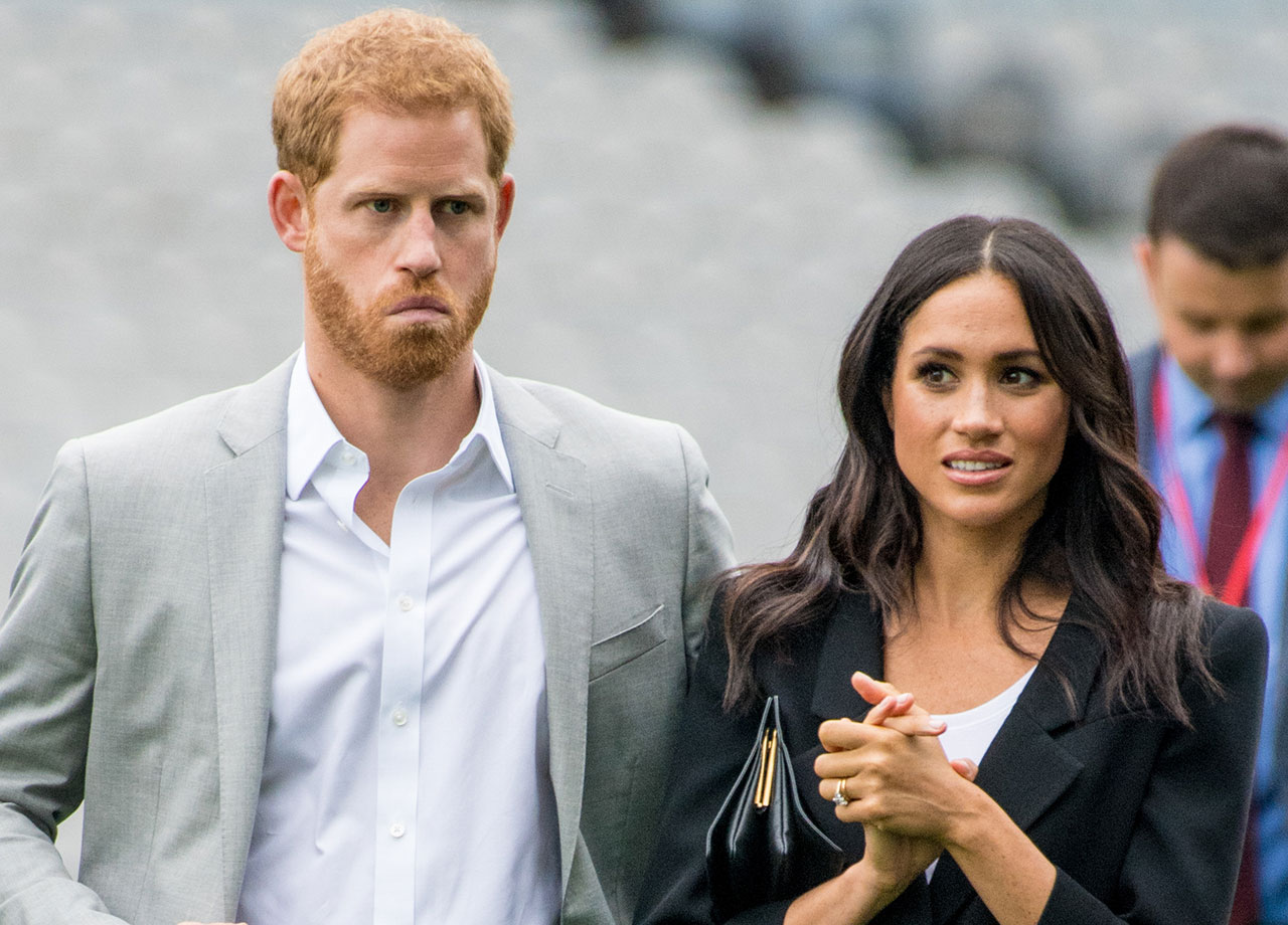 Prince Harry and Meghan Markle making strange faces