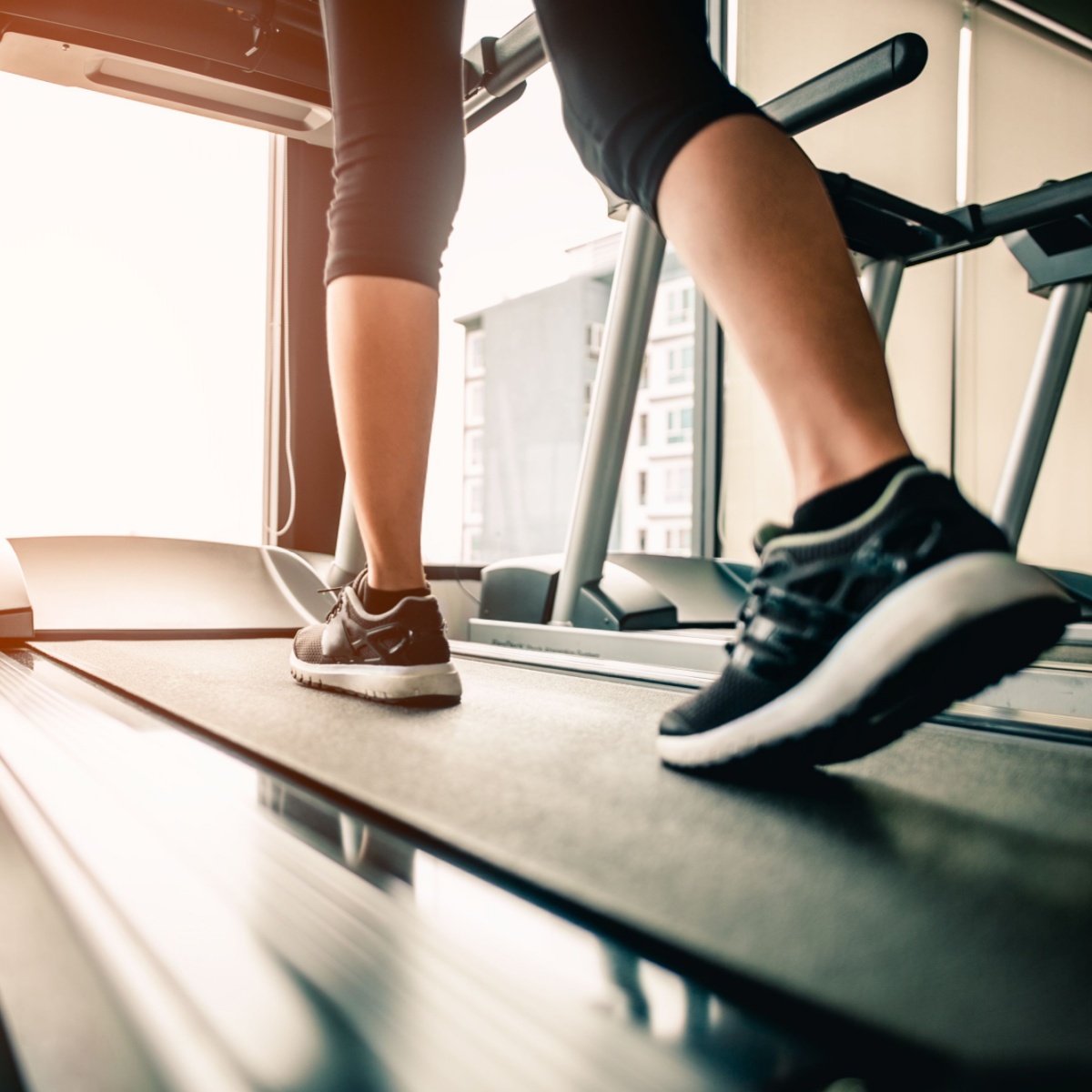 person walking on treadmill