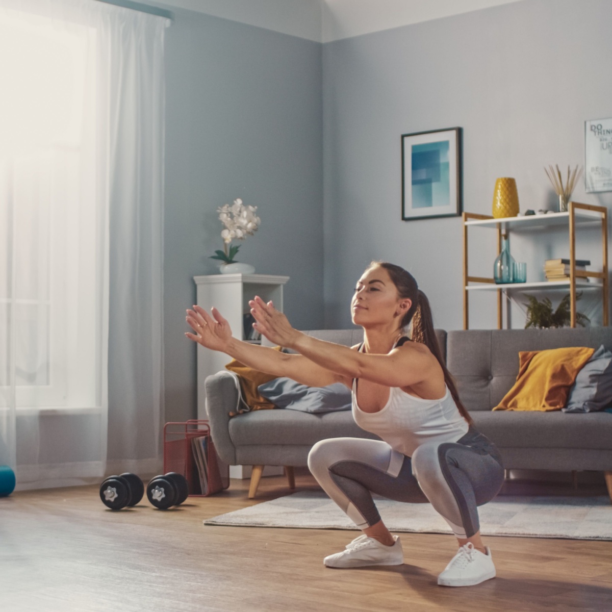 girl doing pilates squats