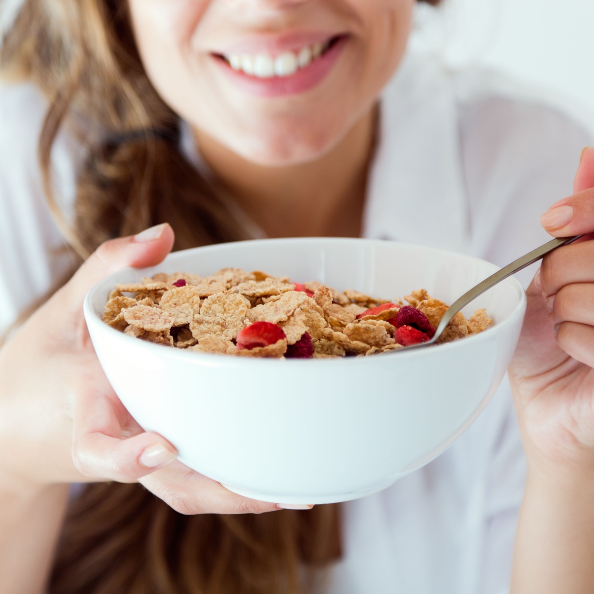 woman eating cereal