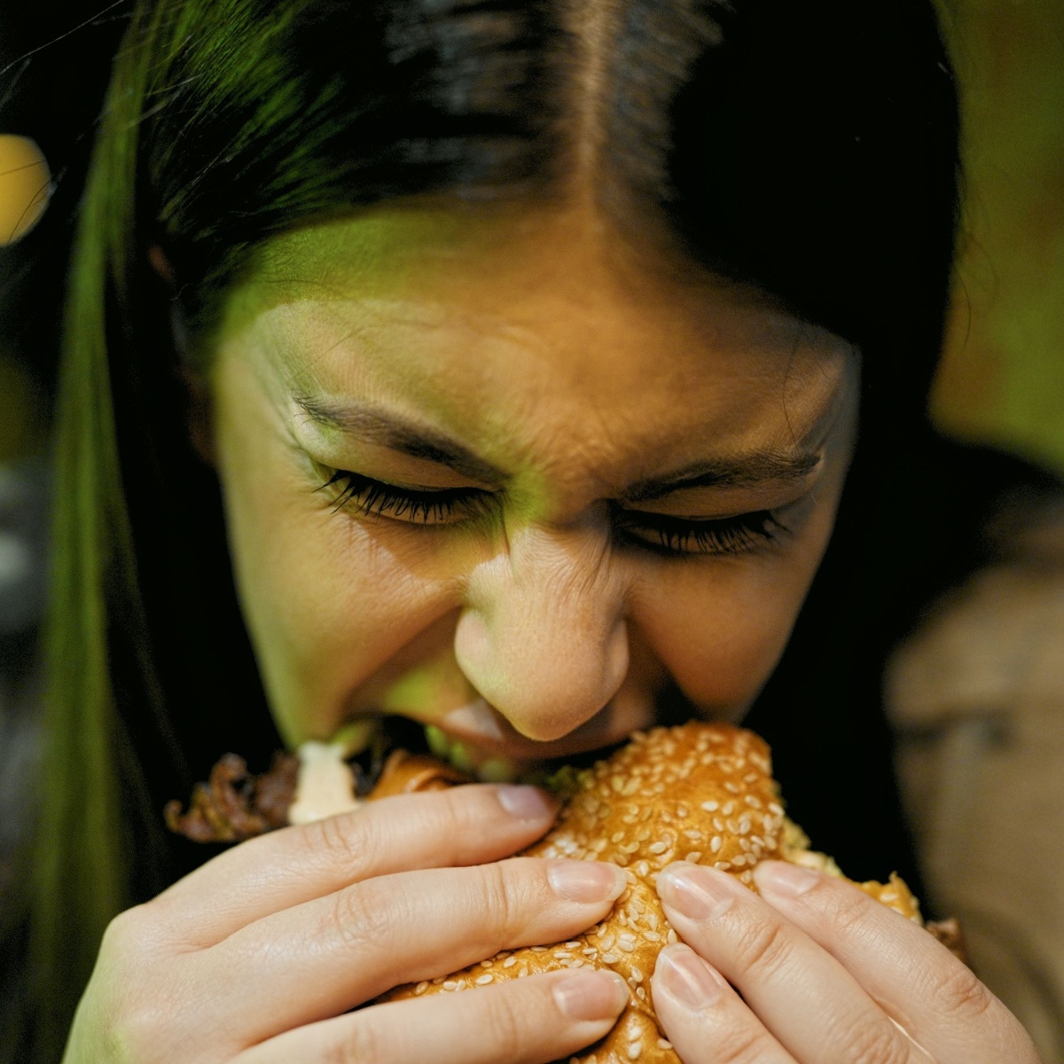 girl eating a burger fast