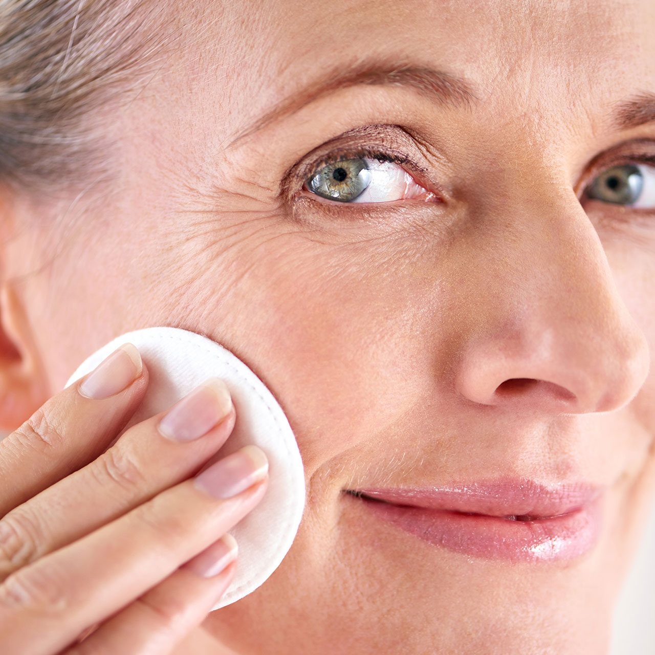 woman-applying-skincare