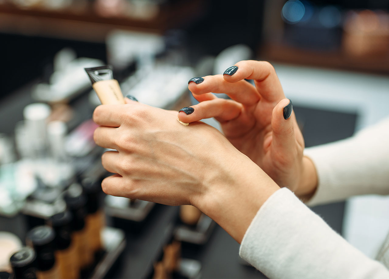 woman-testing-makeup-hands