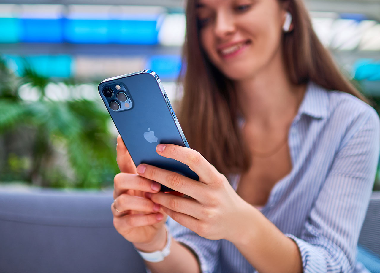 woman-using-blue-iphone