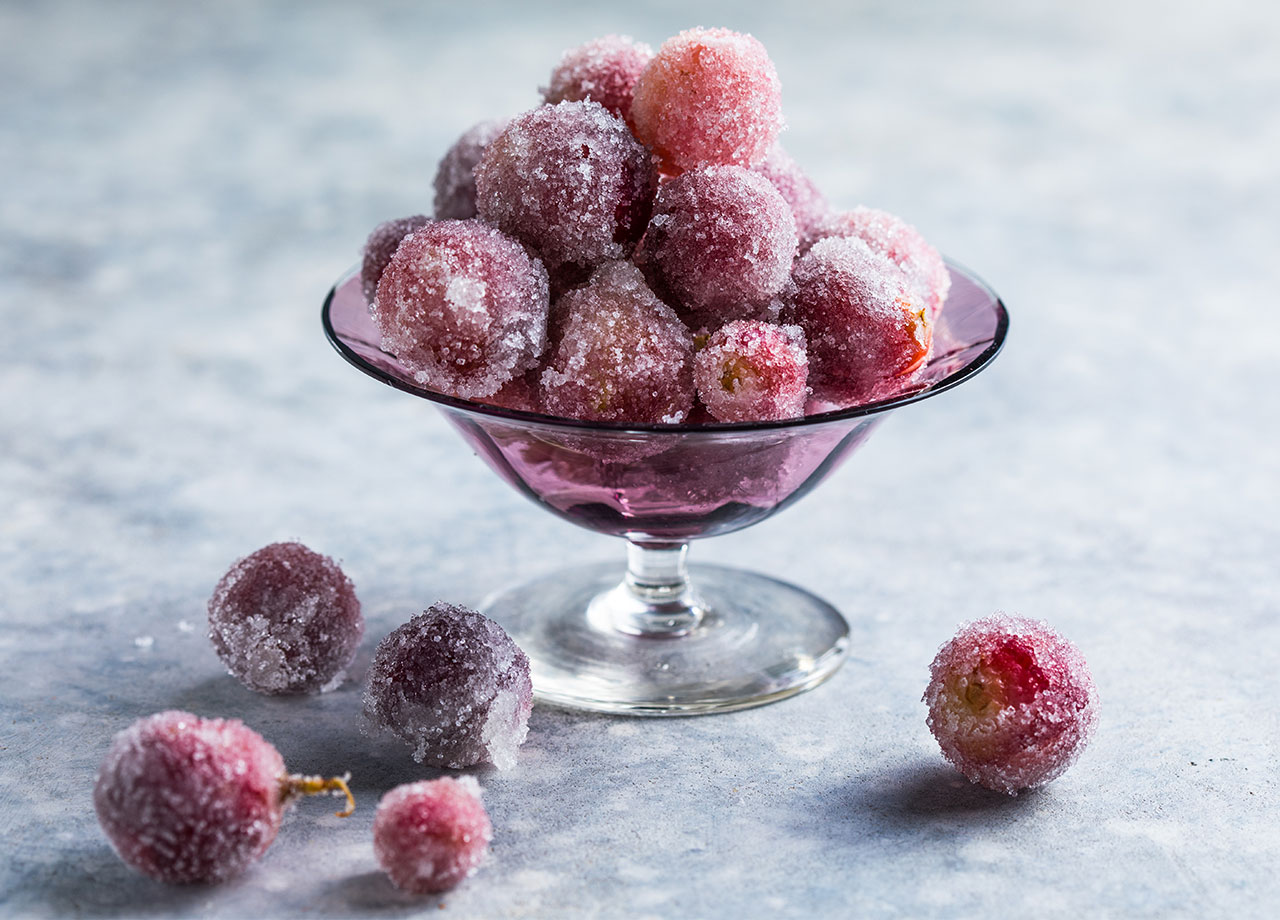 bowl of frozen red grapes