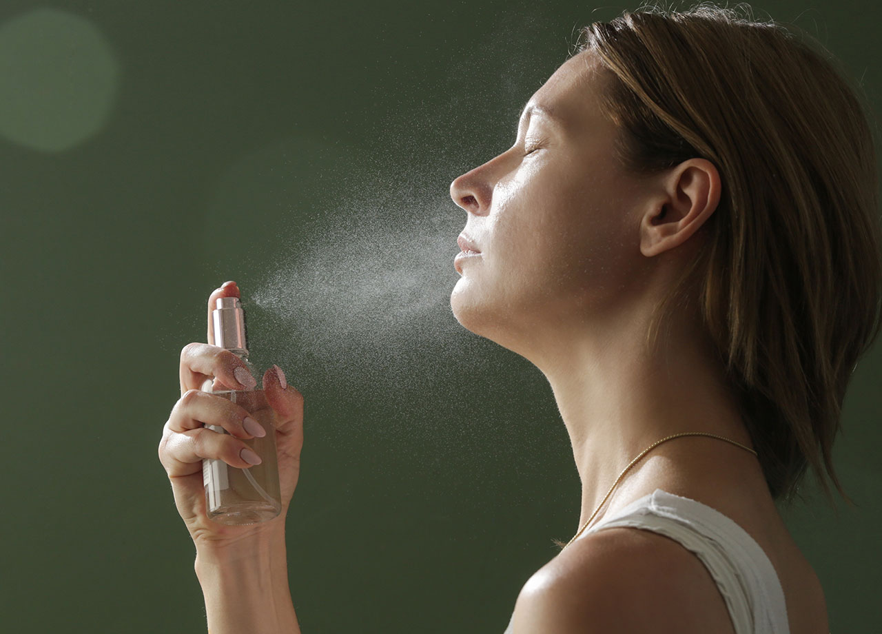 woman-facial-setting-spray