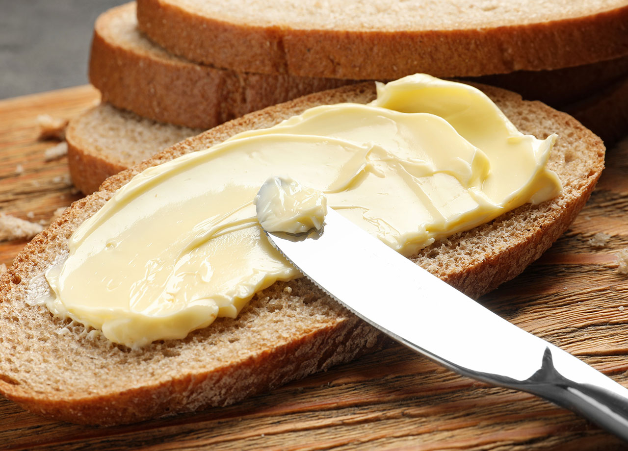 butter spread on bread