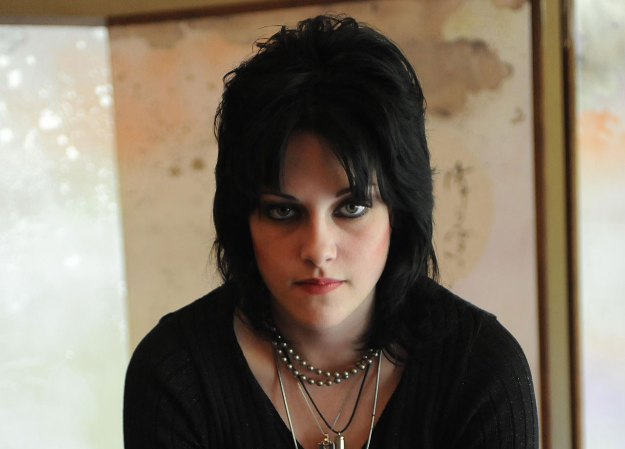 Kristen Stewart as Joan Jett with shaggy hairstyle and bangs