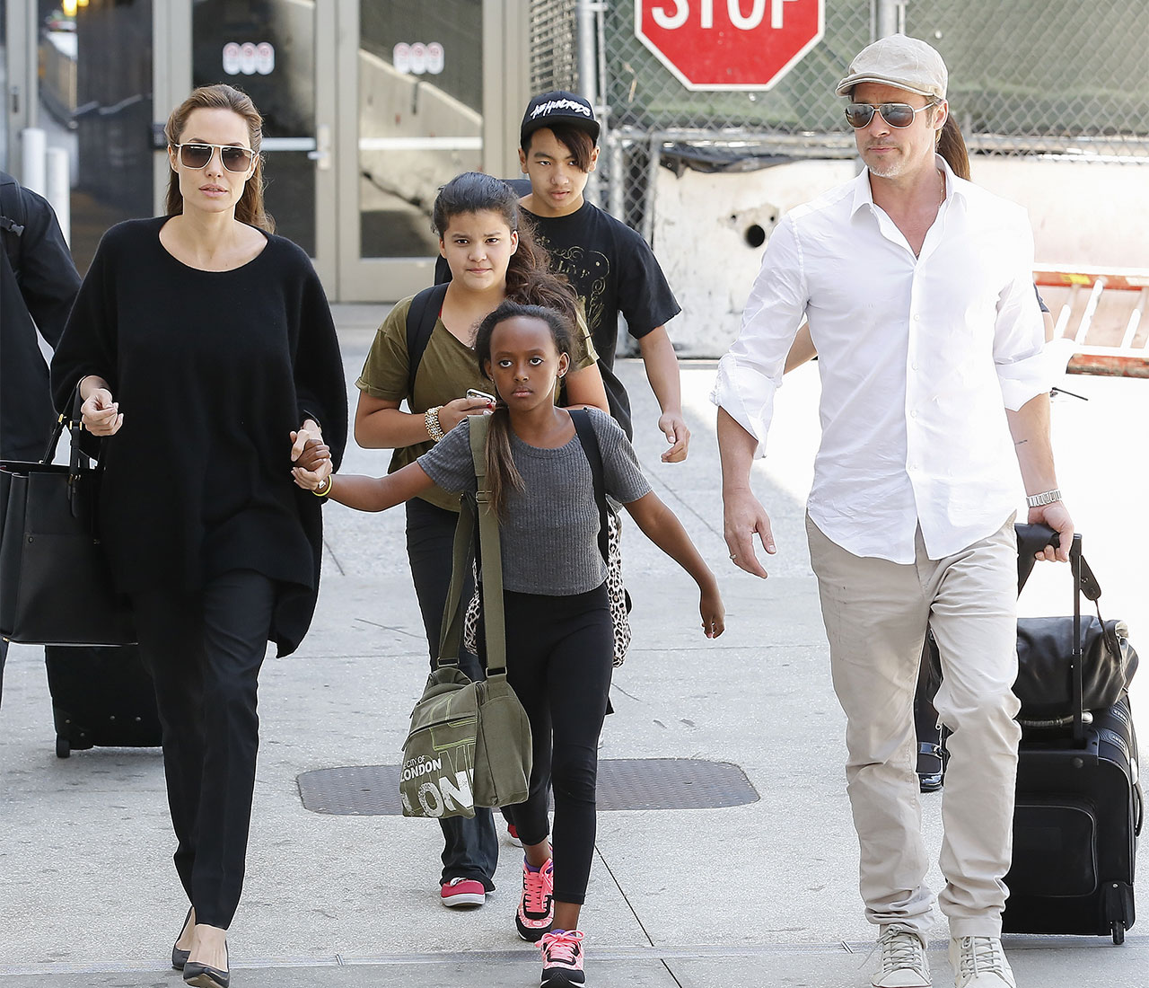 brad pitt and angelina jolie in LA with kids after england trip