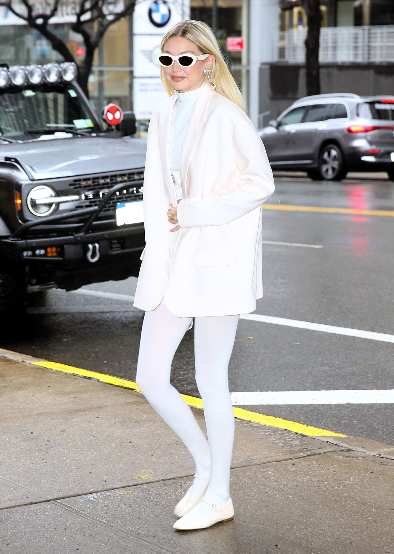 Gigi Hadid in New York all white ensemble white Mary Jane shoes