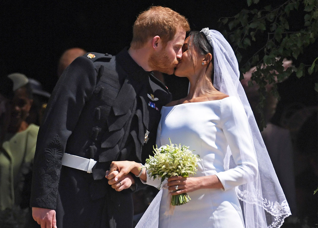 Prince Harry and Meghan Markle royal wedding kiss as they exit St George's Chapel in Windsor Castle