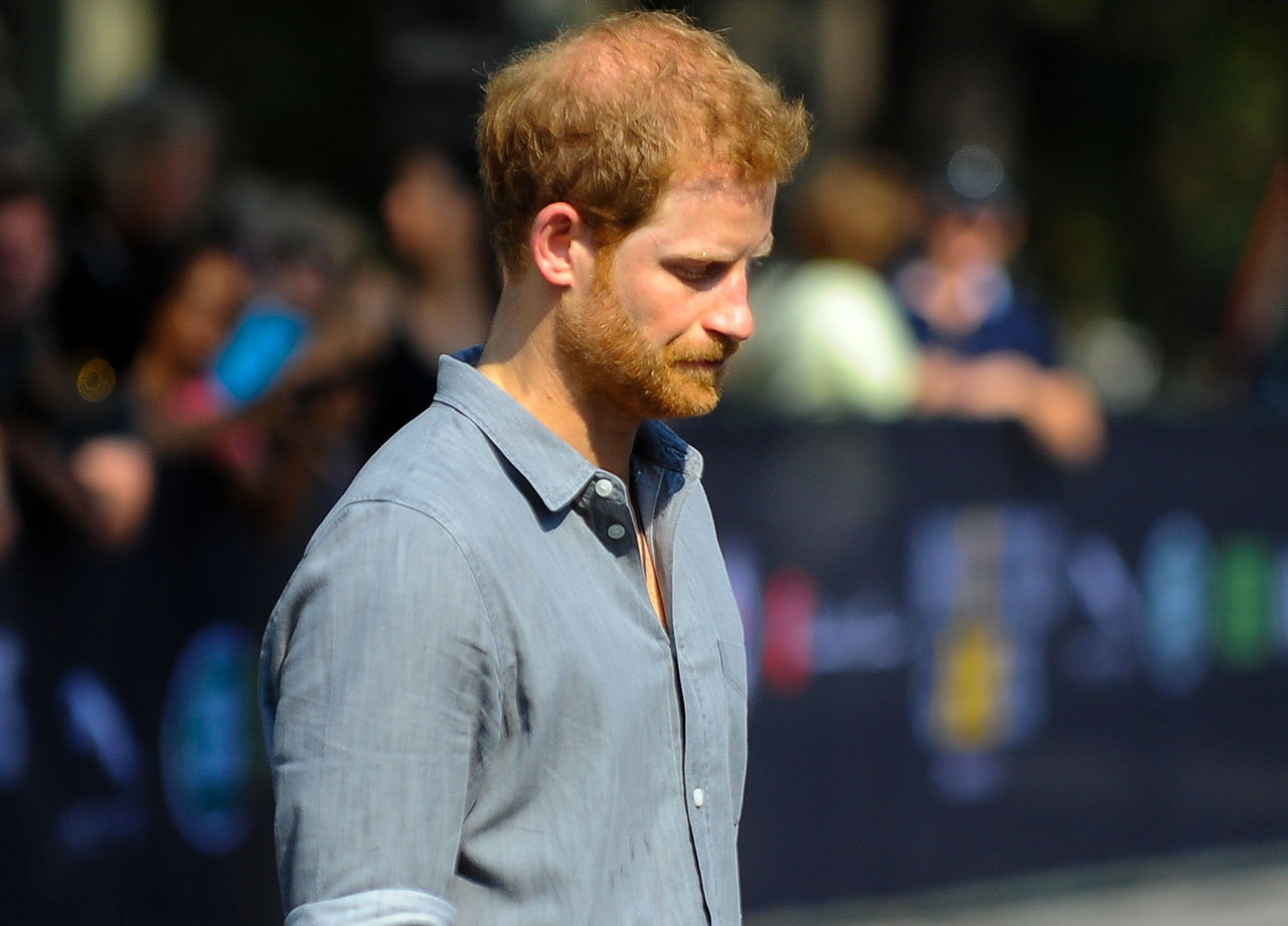 Prince Harry looking somber