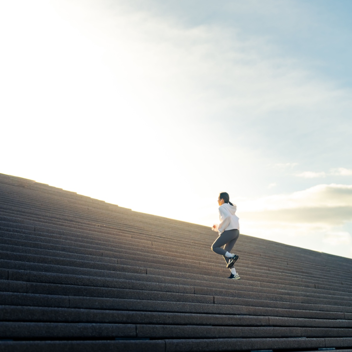 person running up the stairs