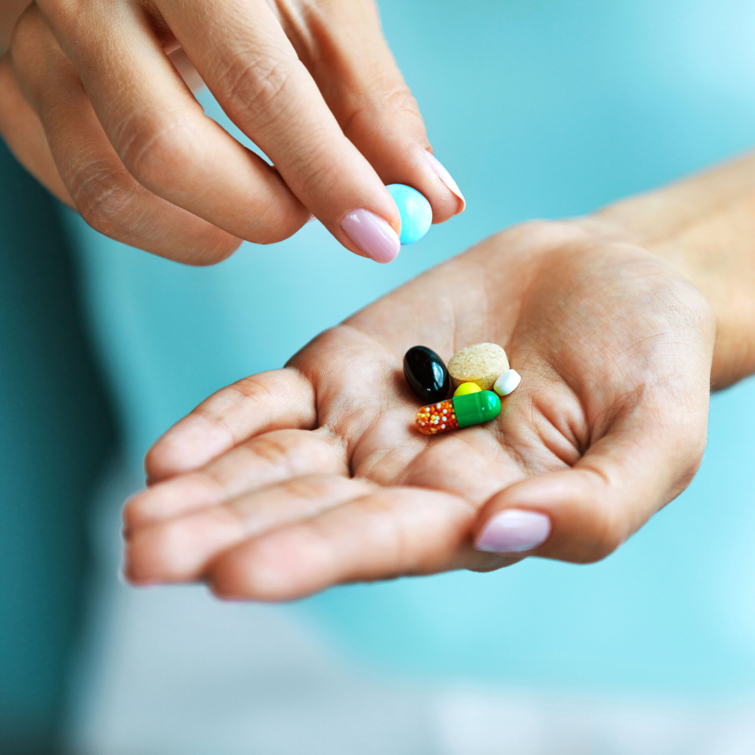 woman taking supplements