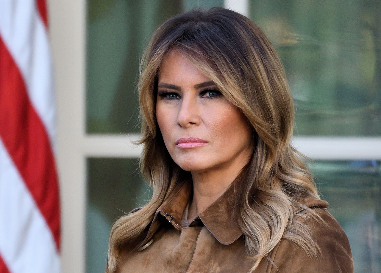 Melania Trump stands in the Rose Garden of the White House