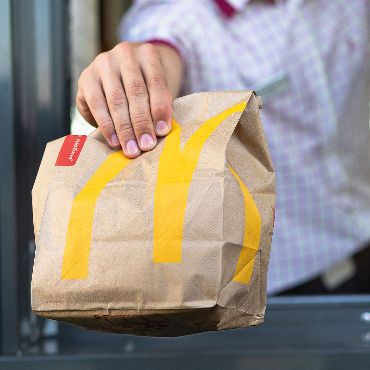 mcdonalds takeout bag at drive-thru