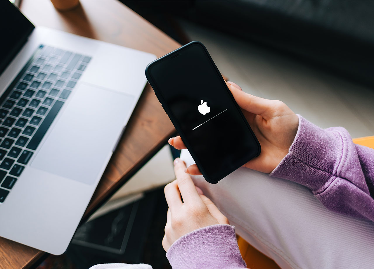 woman-holds-slow-iphone