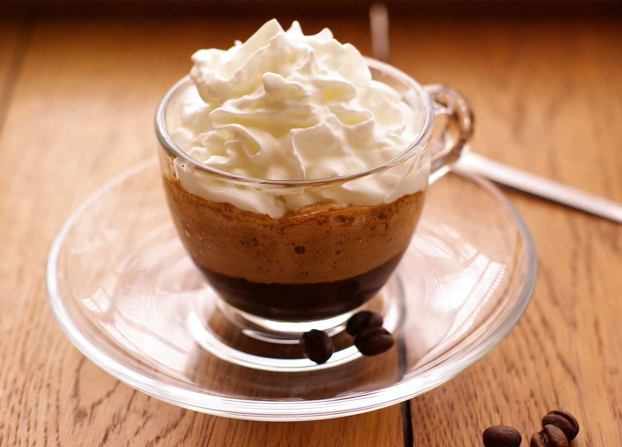 sweetened coffee drink with whipped cream