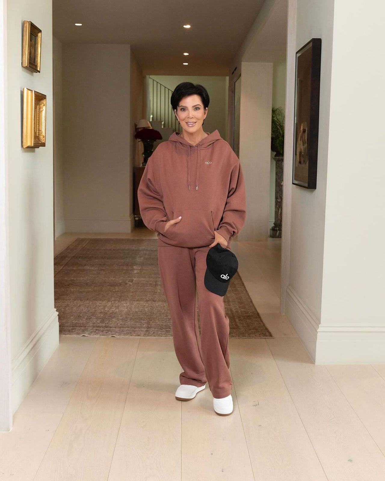 Kris Jenner Alo Yoga Instagram photoshoot pink set black hat