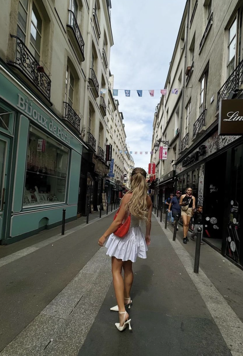 sydney sweeney in paris white dress