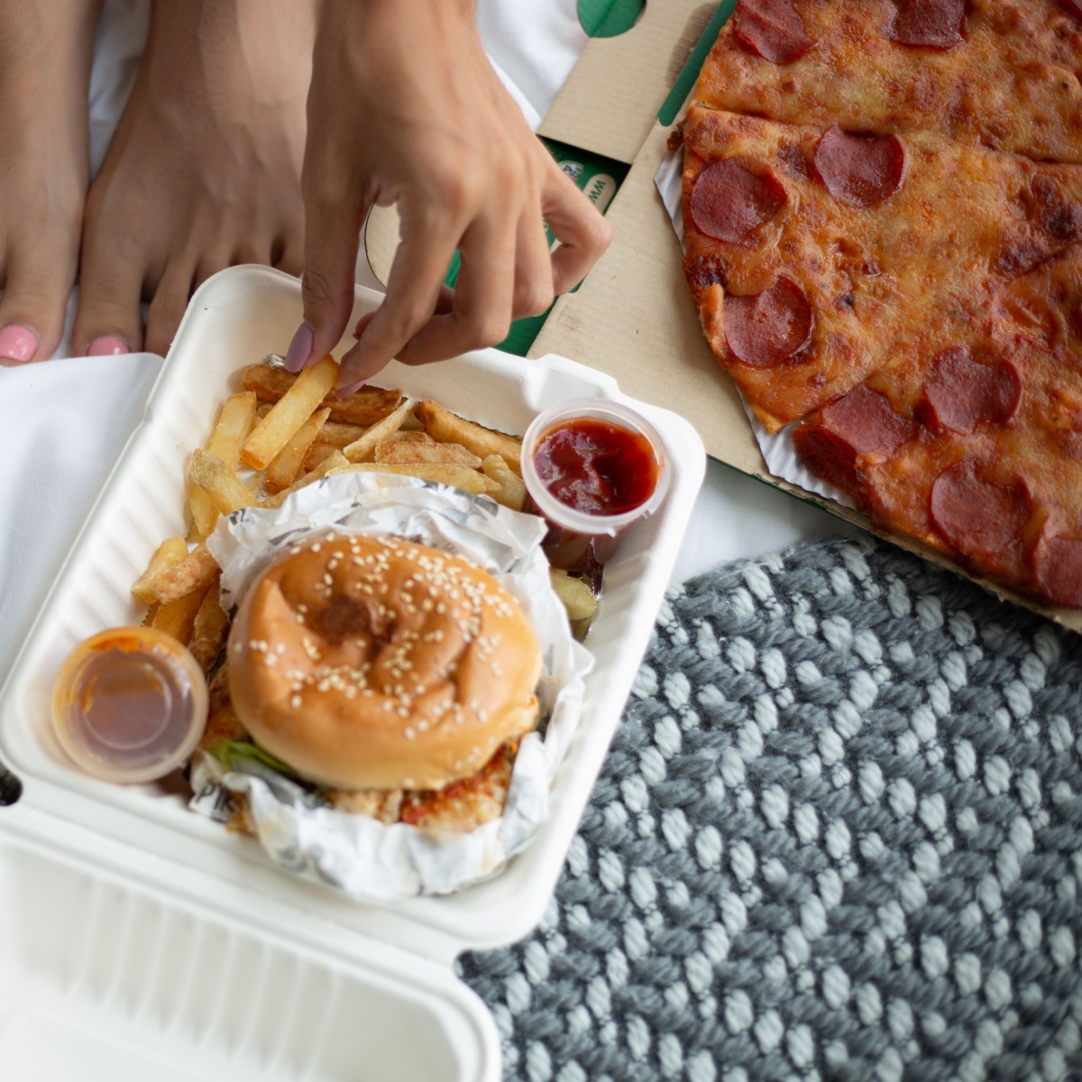 woman eating unhealthy carbs