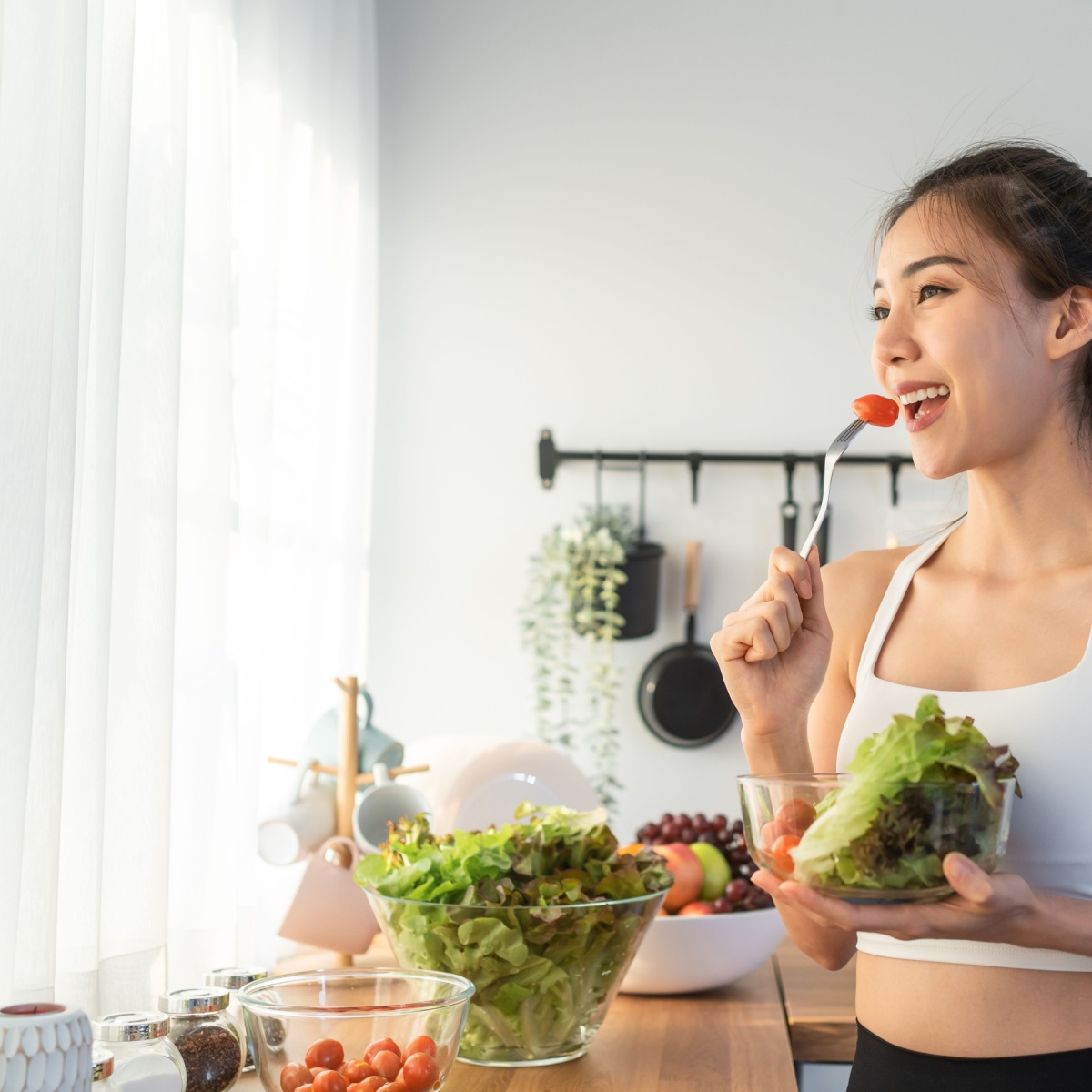 woman eating salad