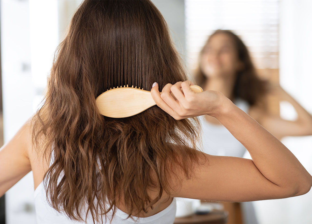 woman-brushing-hair