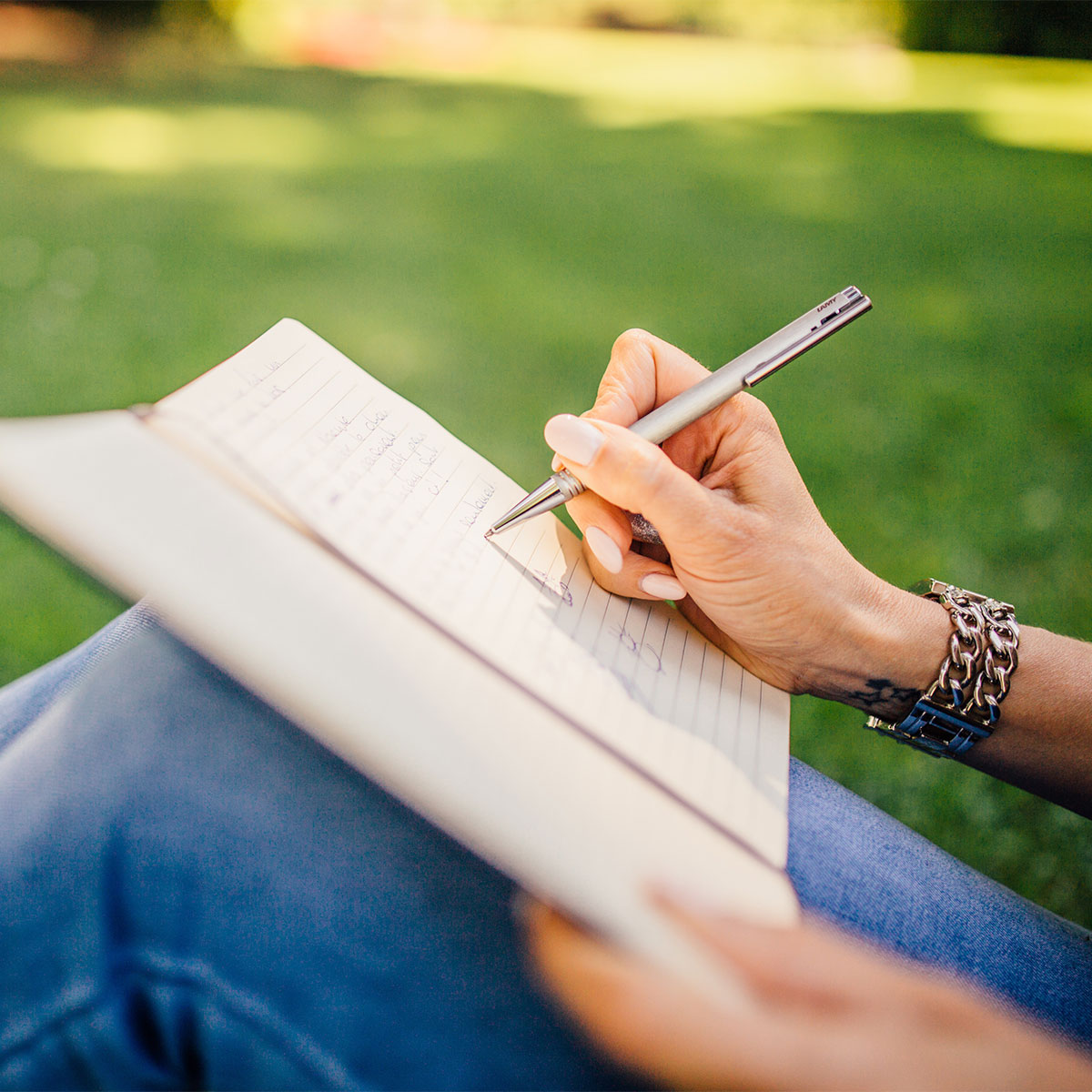 woman journaling in park