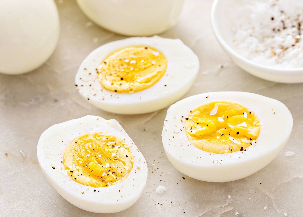 hard boiled eggs peeled and cut in half with salt and pepper