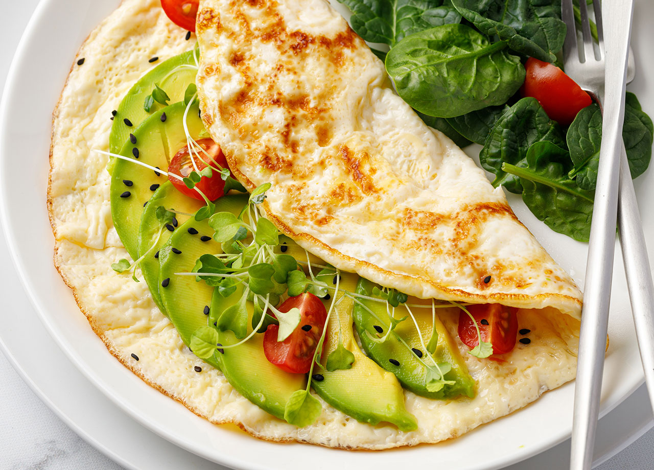 egg white omelette with vegetables avocado and cherry tomatoes