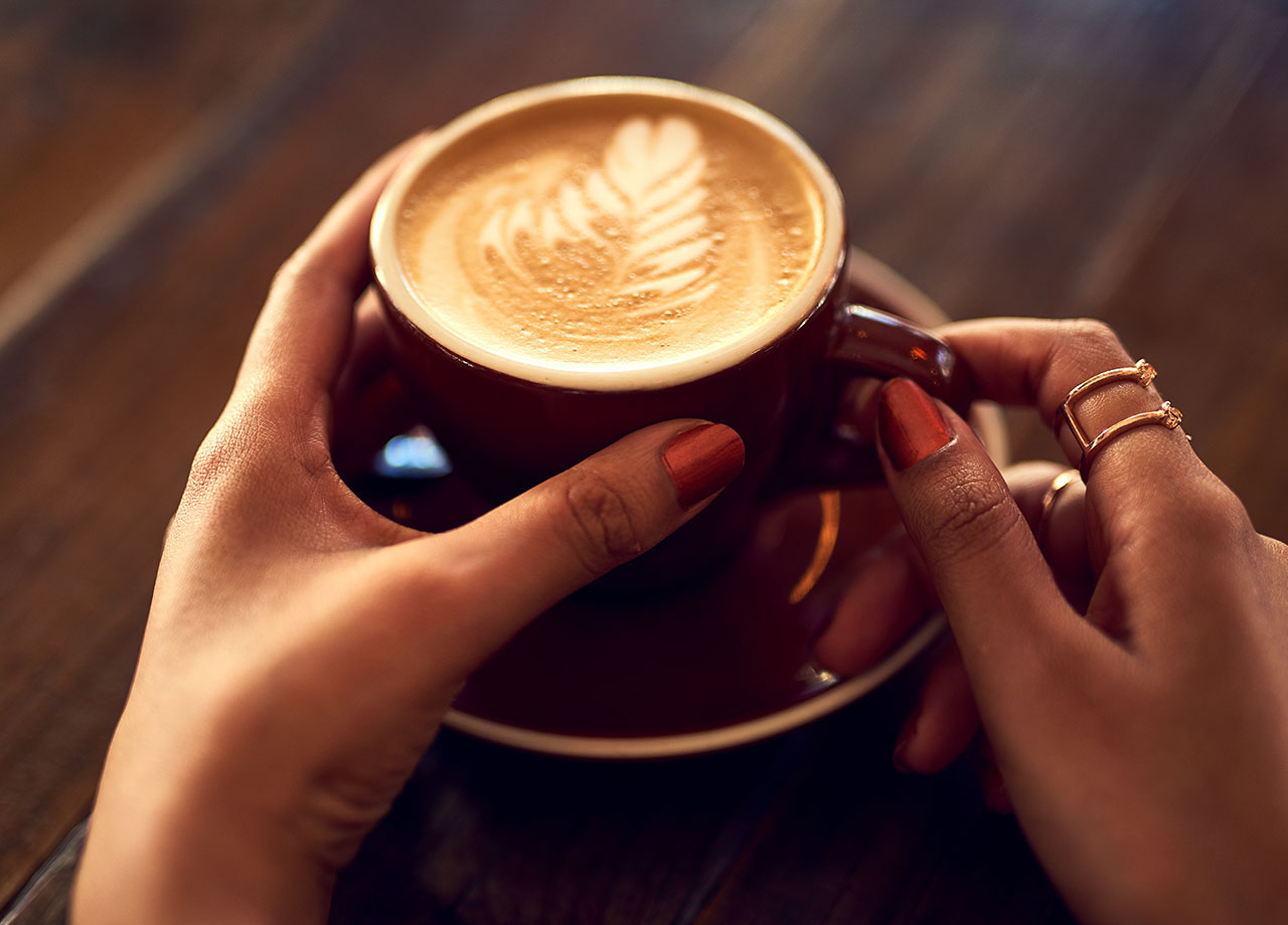 hands-holding-coffee