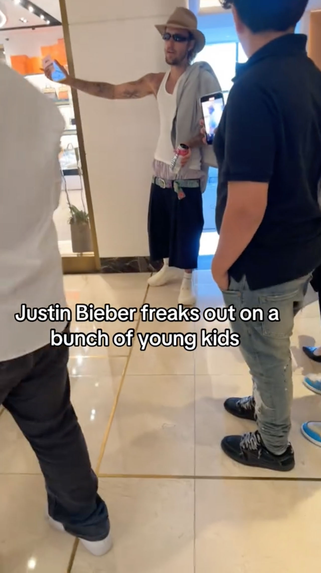 Justin Bieber telling teenagers to leave him alone Beverly Hills hotel lobby