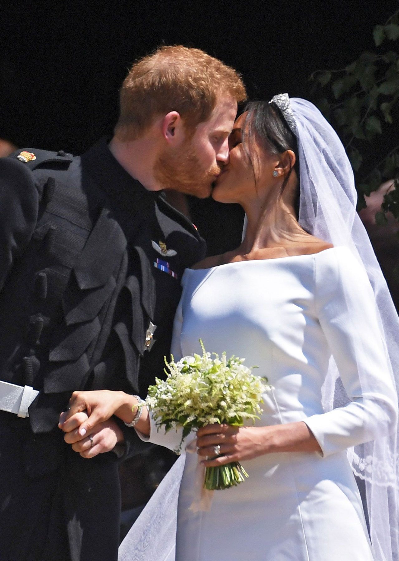 Prince Harry and Meghan Markle at their royal wedding in 2018