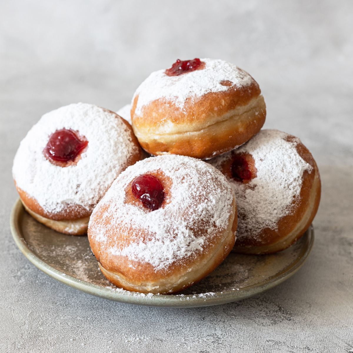 powdered donuts with jam