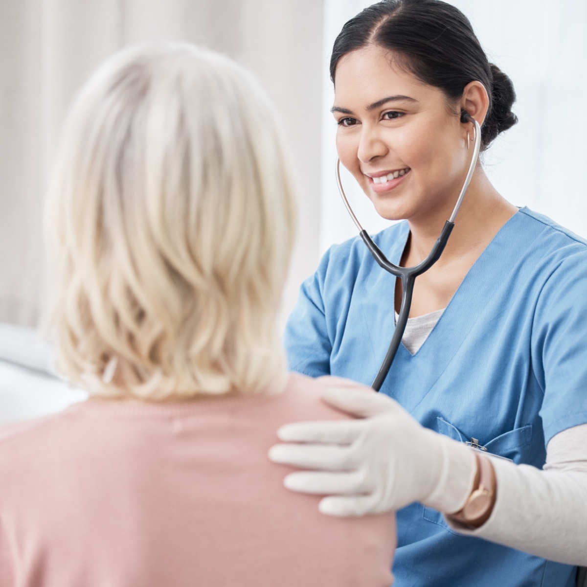 nurse checking up her patient