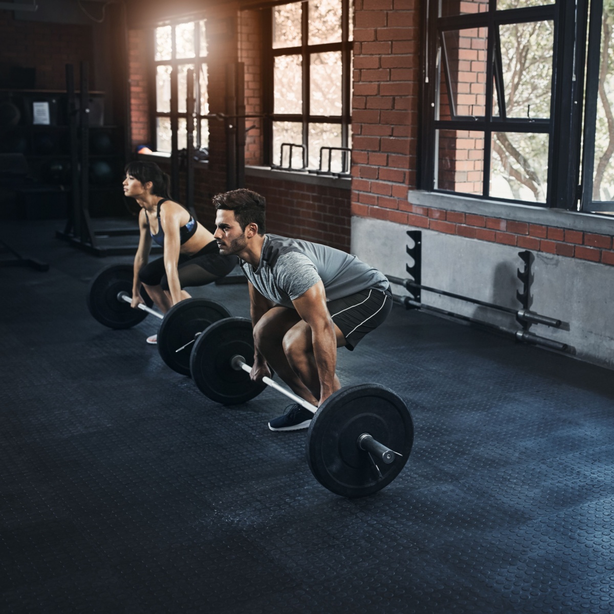 person doing deadlifts