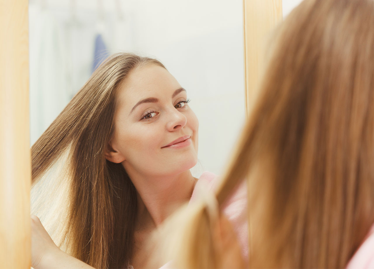 woman-brushing-hair